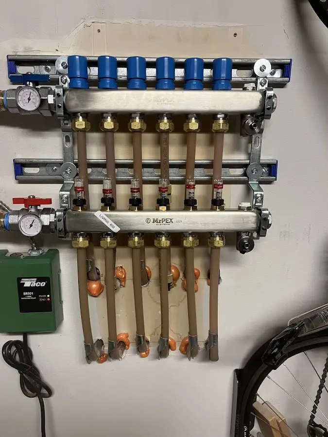 Plumber performing Gas Leak Detection at a residential property in Norfolk